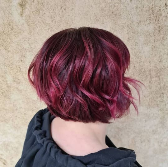 Black Shaggy Bob with Pink Highlights