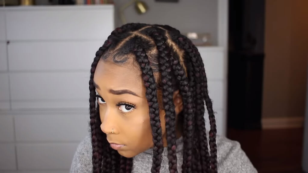 knotless braids with curls