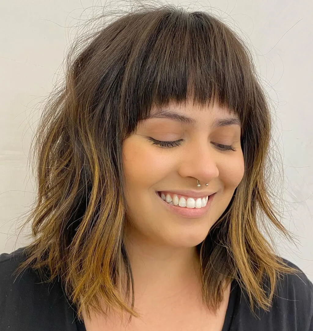 Sleek Shoulder Length Side Swept Cut