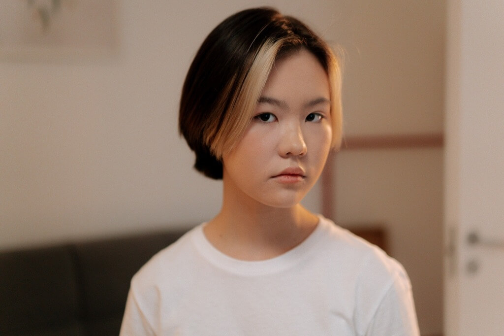 Apple Cut Hair With Short Side Bangs