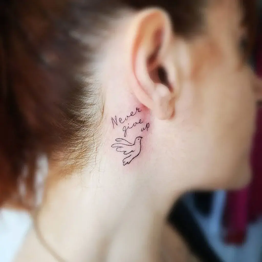 'Never Give Up' Tattoo