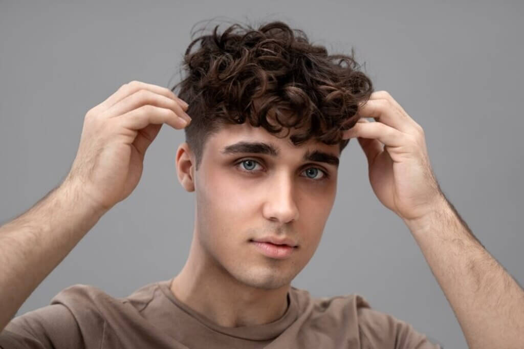 Mid Fade Cut with Curly hair
