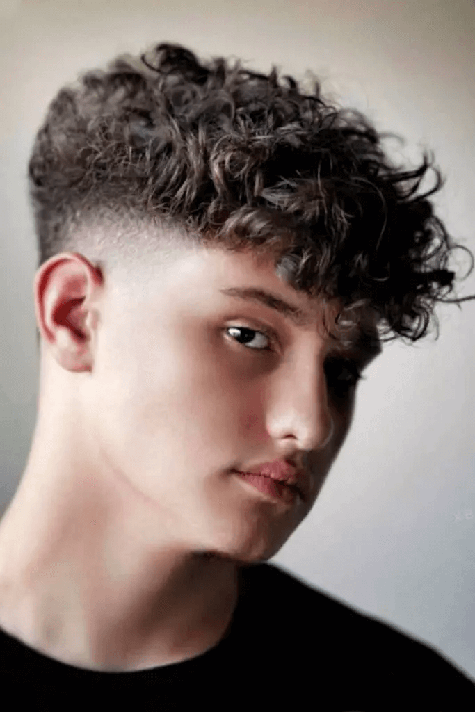 Curly Thick Top With Mid Taper Fade